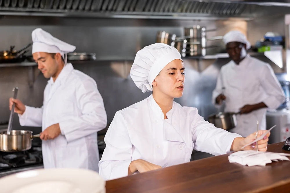 Group of chef's working in a busy kitchen