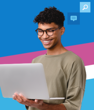 Smiling person holding a laptop